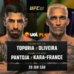 Charles Oliveira posa para fotos após bater o peso para o UFC 317